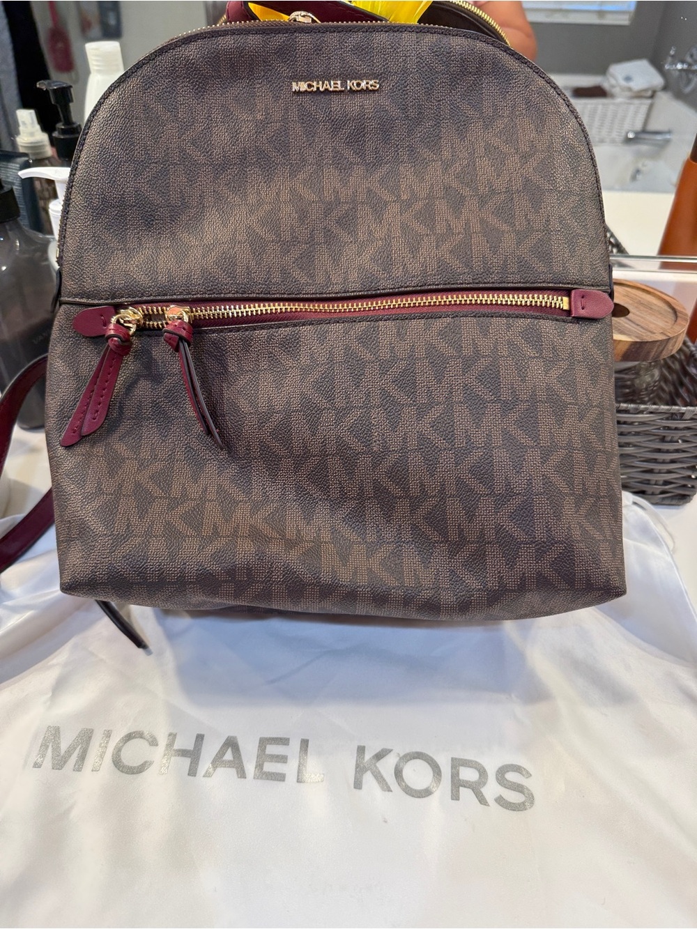 Michael Kors Brown Logo Backpack with Burgundy Trim and Gold Hardware
